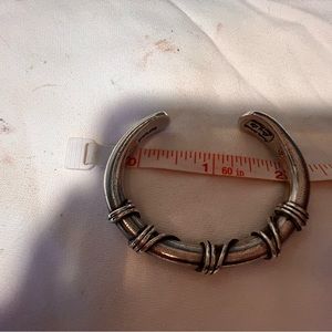 Sterling silver vintage Navaho bracelet.  Hand crafted by known artist.